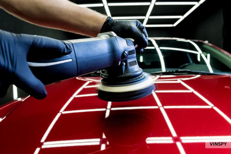 Car polishing after repairs showing how much an accident devalues a car’s resale appeal.